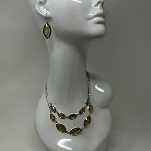 Vintage Gloria Vanderbilt necklace and earring set.